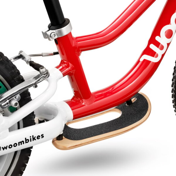 woom surfboard mounted on bike
