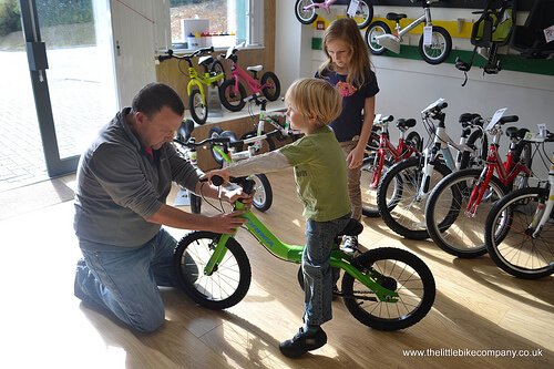 Adjusting the seat height on a childs bike with Simon at the little bike company