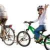 Child Riding Bike Attached to FollowMe Tag Along