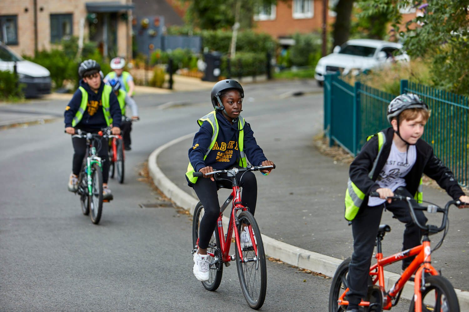 Kids cycling on a road