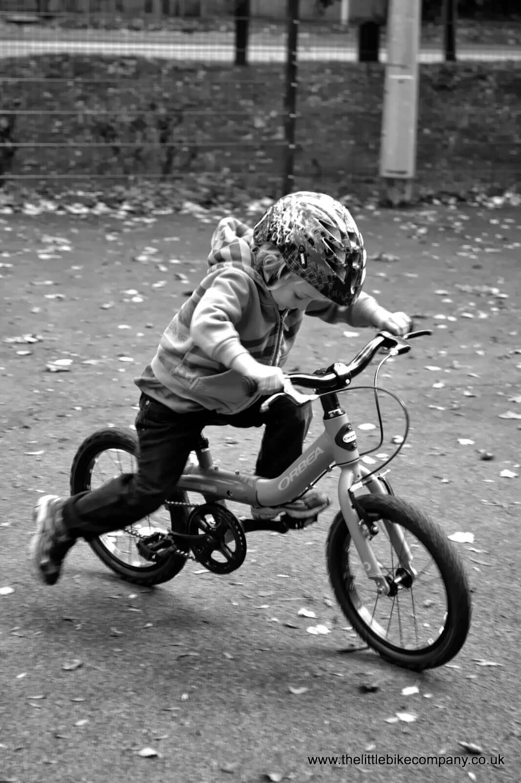 Pushing off teaching a child to ride a bike